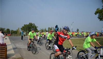 镇江句容体彩全程助力“2016年世界无车日骑行体验赤山湿地活动” (7).jpg