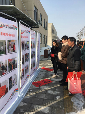 3、墨香飘溢暖人心 镇江句容体彩开展“送春联下乡”活动照片.jpg