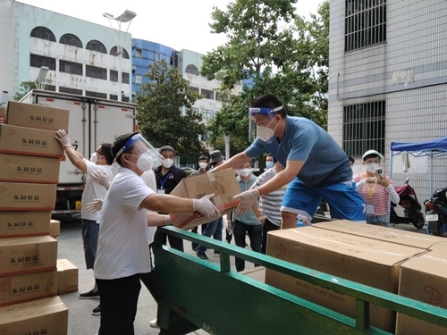 全力以赴 同心抗疫  风雨中的坚守的扬州体彩抗疫人 (1)_副本.jpg