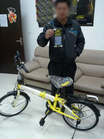 黑旋风刮起绿色骑游风 宿迁彩民收获时尚自行车13627.jpg