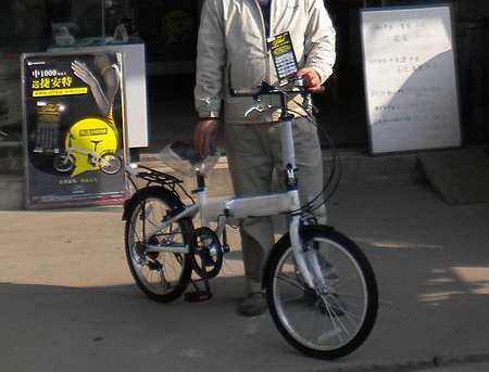 美丽兴化招风又引蝶 彩民频享奖金单车双重喜悦12249-1.jpg